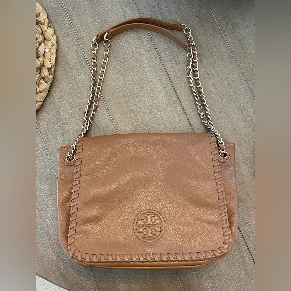 Tory Burch small flap shoulder purse.